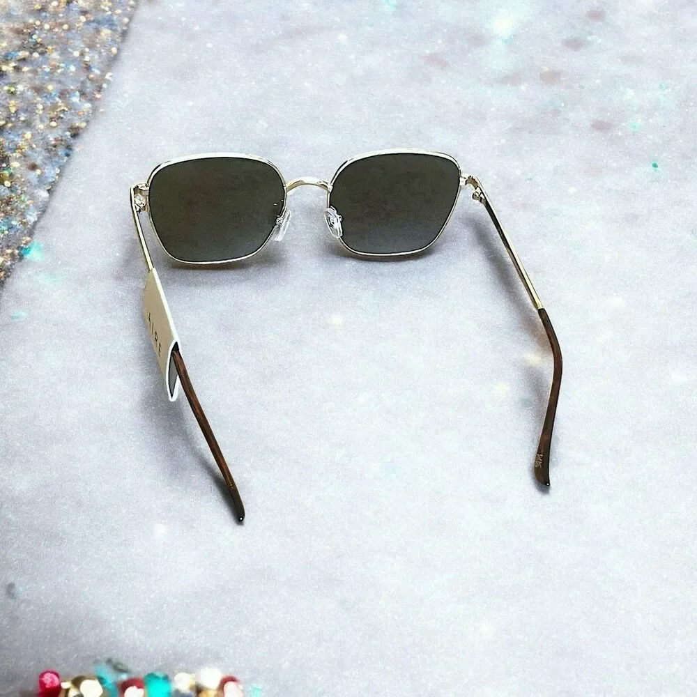 AIRE Women's Spiral Sunglasses in Gold Brand New With Tags